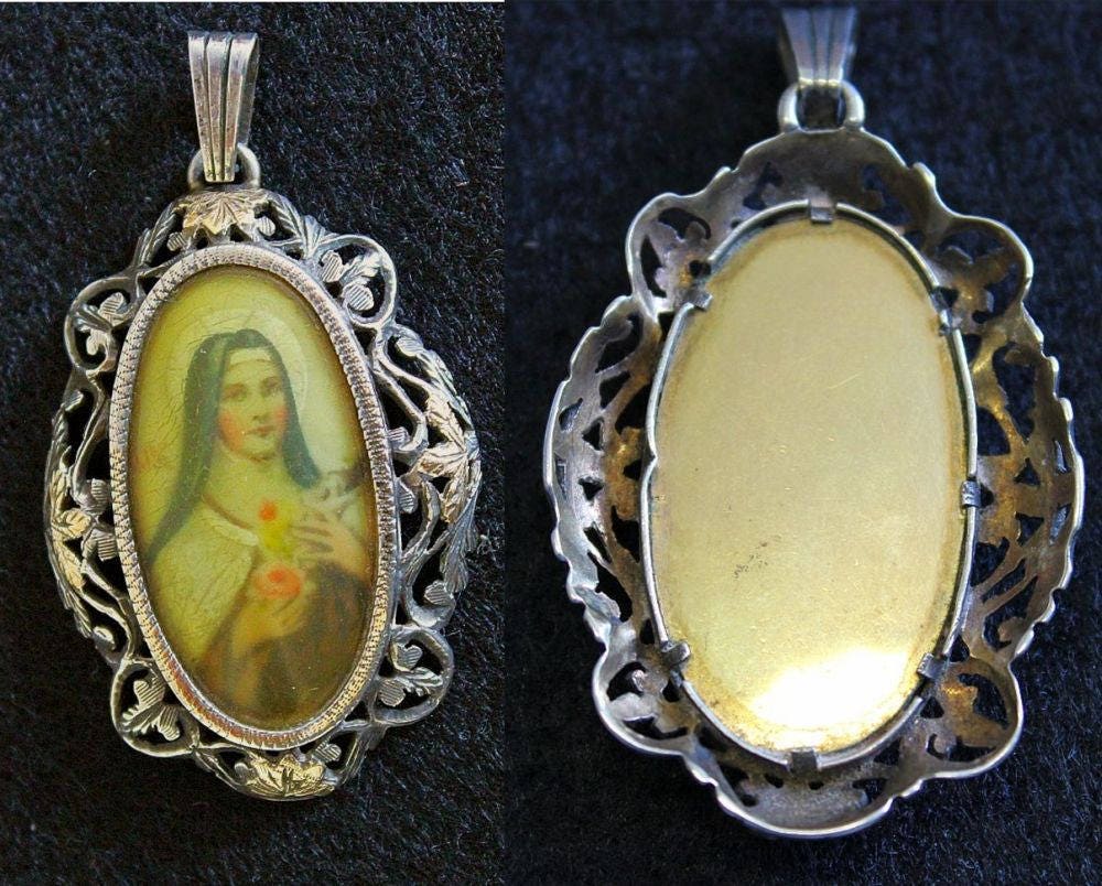 XIXth Century Gold and Sterling Medal Pendant of Hand Painted Miniature of St. Therese with Sterling Chain - EXCEPTIONAL